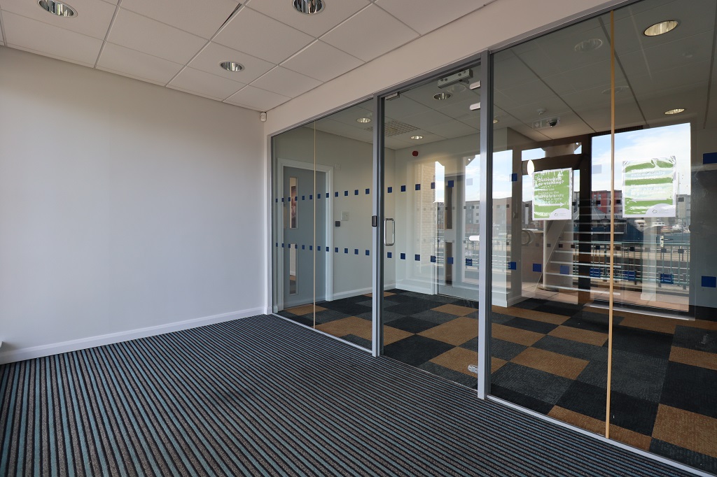 internal view of meeting room with glass window divider